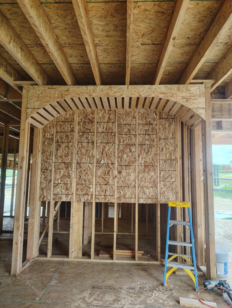 Sheathed arch wall, framed by LX
