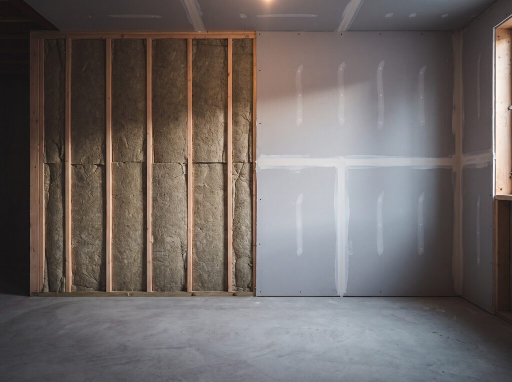 Basement walls with insulation and drywall